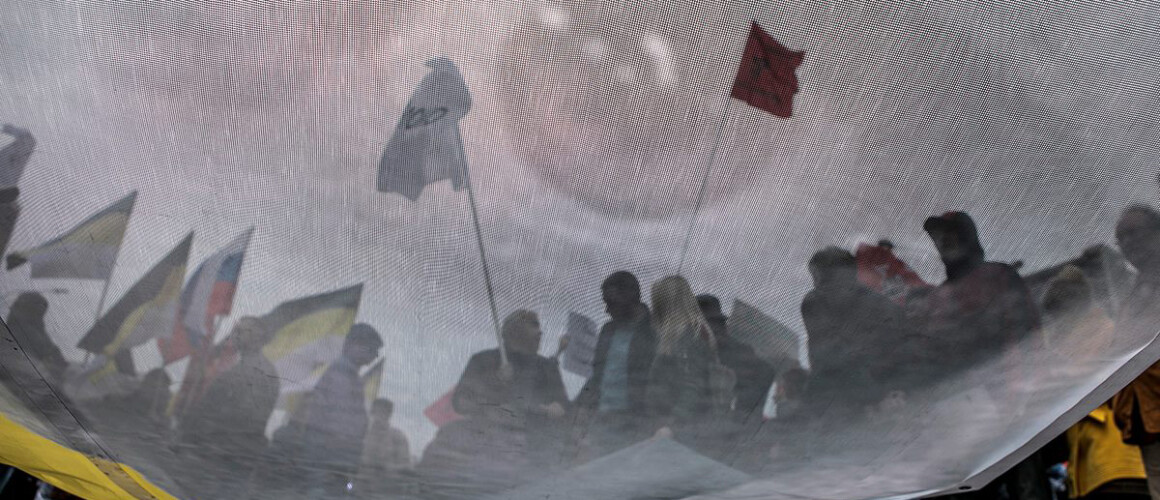 	 Фрагмент баннера с изображением Олега Сенцова на митинге, 11 июня 2018 года. Фото: Андрей Золотов / МБХ медиа