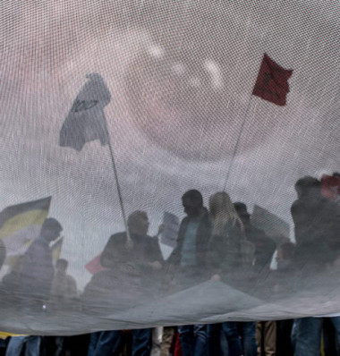 	 Фрагмент баннера с изображением Олега Сенцова на митинге, 11 июня 2018 года. Фото: Андрей Золотов / МБХ медиа