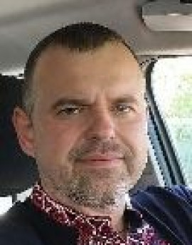 Роман Олейник