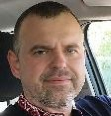 Роман Олейник