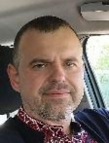 Роман Олейник